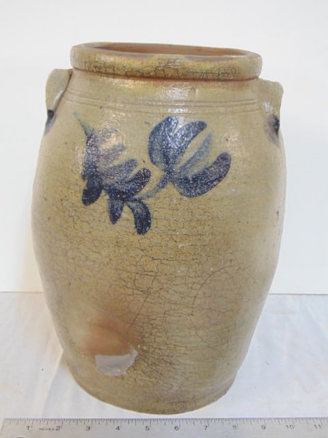 Stoneware crock with handles & floral decoration, #2, hairline around base, has "dent": Stoneware crock with handles & floral decoration, #2, hairline around base, has "dent"