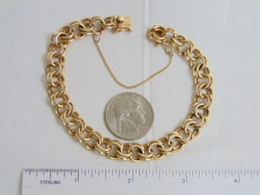 Jewelry. 14kt Vintage Gold charm bracelet, 31.30 grams, size 8 1/2", good condition