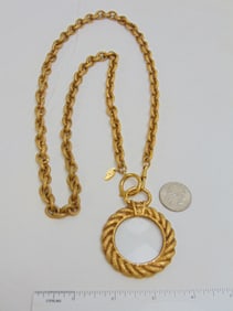 Jewelry. Vintage CHANEL necklace, couture, designer magnifying glass/loupe pendant w/ gold tone