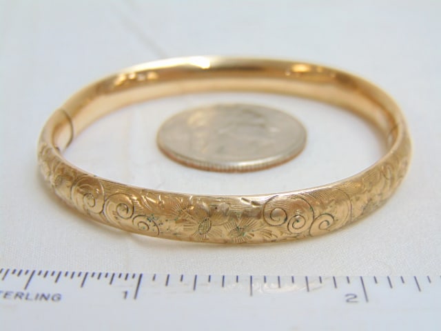 Jewelry. 14kt Vintage Gold bangle, 7.45 grams, scrollwork design, 2" diameter, small size, has a (1 of 3)
