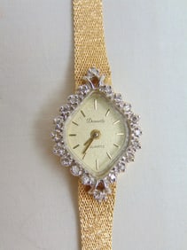 Jewelry. Vintage 14kt gold Diamond ladies Deauville wristwatch, brush gold design, 0273 on back &