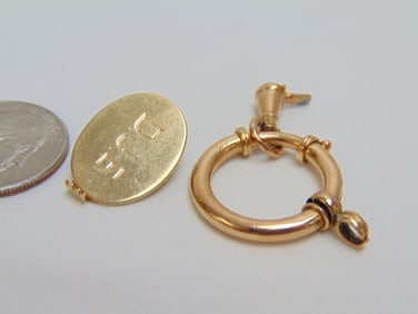 Jewelry. 18kt Gold Tiffany & Co. tie clip, D.J.E. 4.95 grams & rose gold tested 14kt bail, 6.40