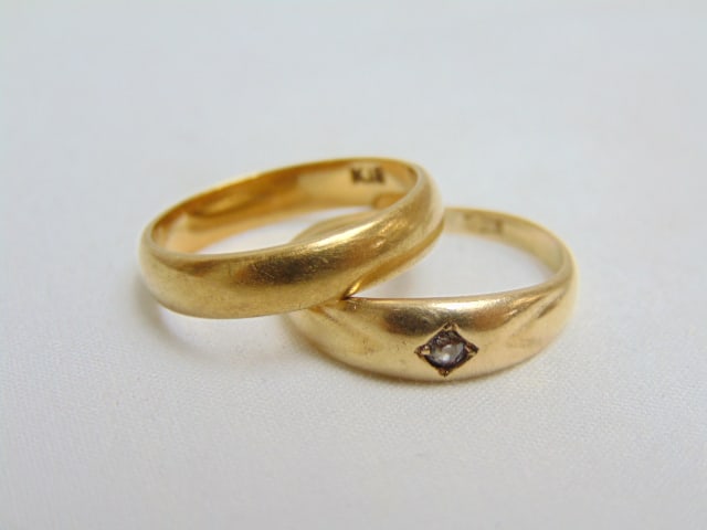 Jewelry. (2) Gold bands/rings 18kt band 3.45 grams, size 6 1/2 & 14kt band w/ inset diamond 2.25 (1 of 3)