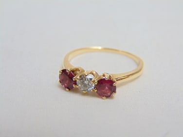 Jewelry. 14kt Gold three stone ring, 2.60 grams, size 8.25, diamond & pink/red gemstones, diamond