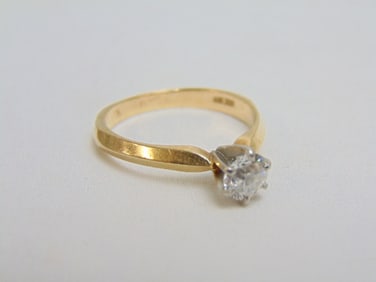 Jewelry. 14kt Gold diamond solitaire ring, center stone 5mm, 4.25 grams, size 10, 6 prong setting,