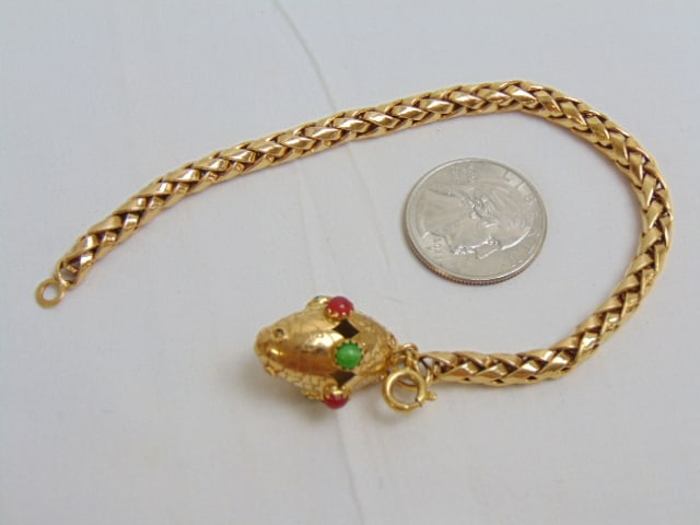 Jewelry. 18kt Gold bracelet w/ 18kt charm w/ gemstones, 15.60 grams, both hallmarked 750. 7 1/2" (1 of 3)