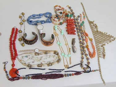 Costume Jewelry lot to include copper cuffs, bead necklaces, watches, etc.