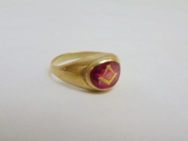 Jewelry. Gold ring, tested 14kt masonic w/ pink/red stone, 4.70 grams, size 10, shank slightly bent