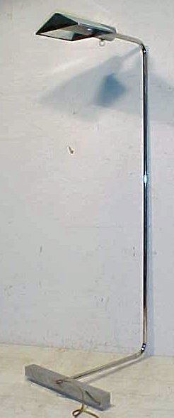 Chrome floorlamp by Cedric Hartman: Chrome floorlamp by Cedric Hartman, rear "leg" missing, chrome has scratches, height is 35.75", this floorlamp came from the Manhattan penthouse, this lamp is not signed.