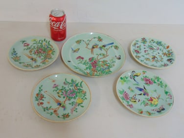 Celadon plates, 4 small plates & one larger, in green with floral, butterfly & bird decoration,