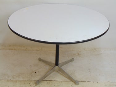 Herman Miller dinette table, white top with original black bumper edge, table is 42.25" in diameter,