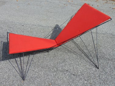 Tom Dixon wire base lounge chair with red upholstery, 62.5" long, 52.5" wide (legs, at ground