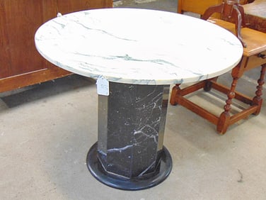Marble top & marble base parlor table, black base with white top, diameter is 36", height is 28.75"