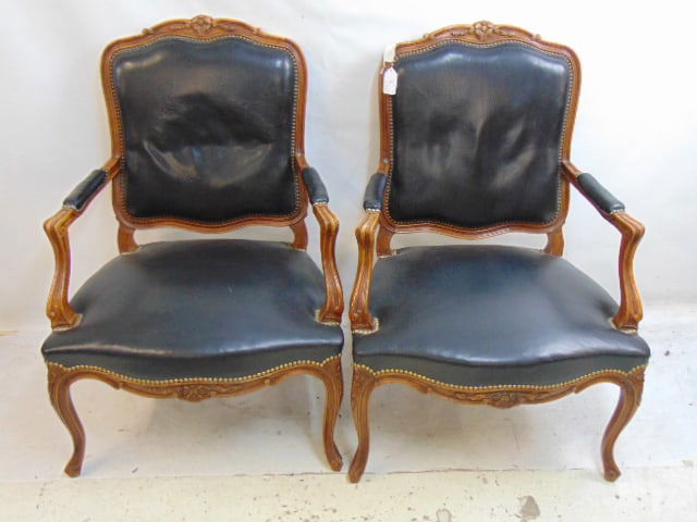 Pair decorative armchairs with carved wood frames and black vinyl seat & back, seats are 27.5" wide (1 of 5)