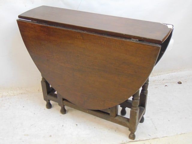 English oak gateleg, drop leaf table, 34" by 10.75" (34" by 48.75" opened), height is 26.5" (1 of 4)