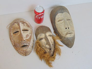 3 African funerary masks, Gabon "Fang" mask, 12.25" by 6"; "Idimu" mask, Lega, Congo, 10 5/8" by 6"