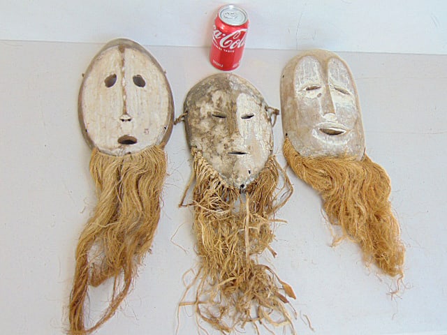 3 African antique funerary masks, with "beards", masks are all around 10" plus the beards.: 3 African antique funerary masks, with "beards", masks are all around 10" plus the beards.