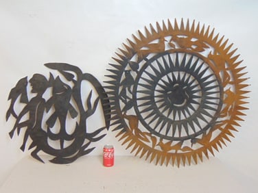 Two metal Haitian folk art sculptures by Almann Ulysse, made from steel drums, signed "Almann",