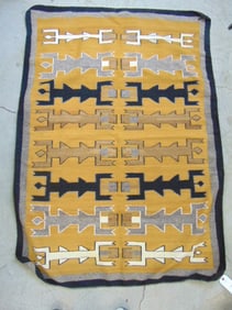 Navajo blanket, weaving, mustard colored with figures, 66" by 47"