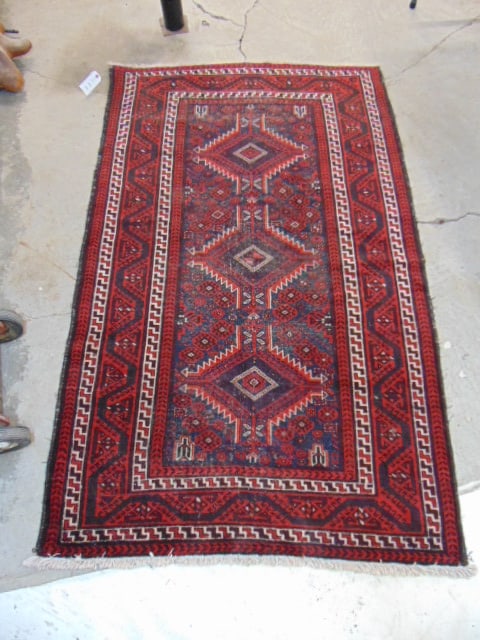 Persian carpet, red & black, rug is 84" by 52" worn: Persian carpet, red & black, rug is 84" by 52" worn