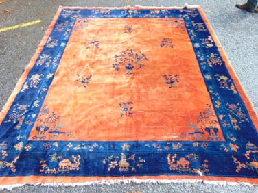 Room Size Chinese carpet, salmon color with blue border, 9'7' by 8'
