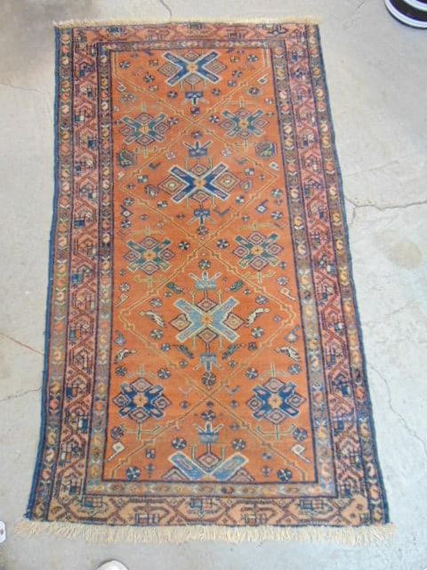 Persian carpet, brown reddish center, rug is 70" by 40" (1 of 4)