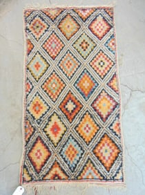 Colorful wool scatter rug with diamond pattern, carpet is 53" by 29.5"