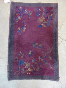 Chinese scatter rug, in dark purple, carpet is 57" by 37"