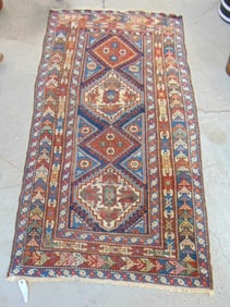 Persian scatter rug, brown, blue, carpet is 74" by 42"