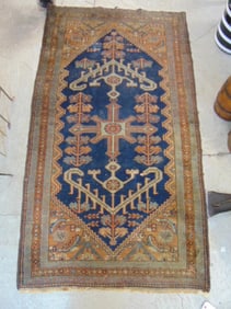 Scatter rug, brown, blue, some wear, carpet is 73" by 42"