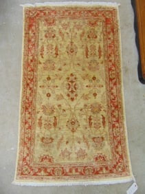 Small scatter rug beige & red, rug is 56" by 33"