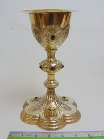 Sterling silver chalice, with gold wash, inlaid with stones (garnets ?), with cover, 16 troy