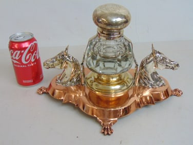 Copper & silver plated cut glass inkwell decorated with horse heads, lid on ink reservoir loose,
