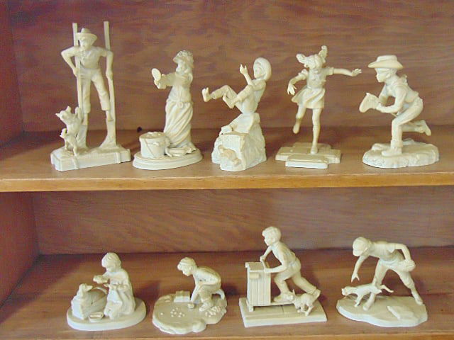 9 Franklin mint Norman Rockwell bisque figurines, "Joys of Childhood": 9 Franklin mint Norman Rockwell bisque figurines, "Joys of Childhood", one dog is missing part of leg.