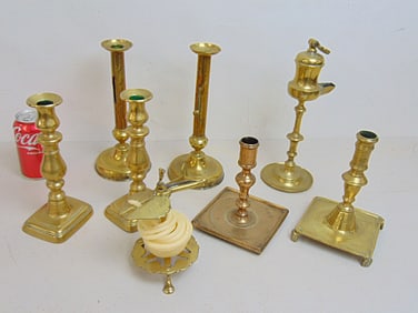 Lot antique brass candle holders & oil lamp, includes pair push up sticks (one missing button),
