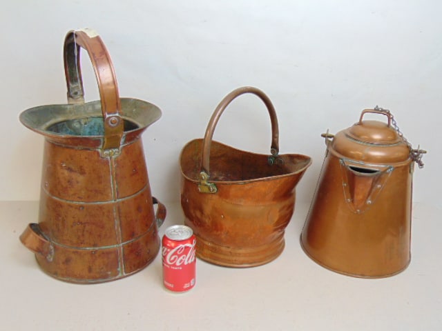 Two large copper water cans & copper coal scuttle, one water can is lidded, lidded water can is (1 of 4)