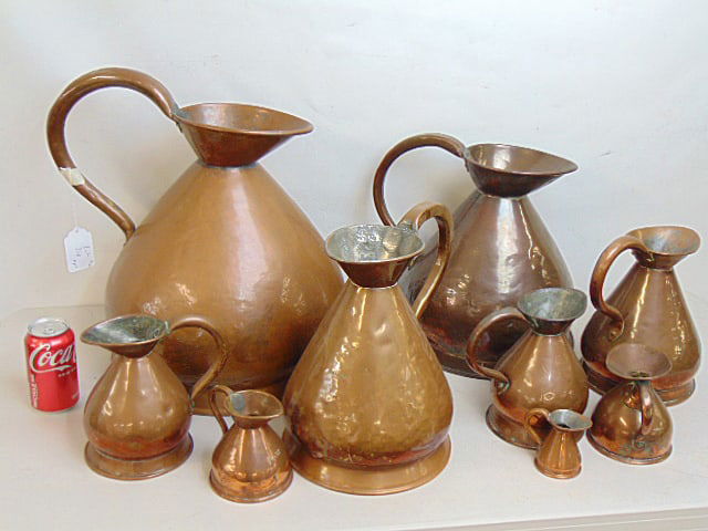 lot 8 antique copper haystack measuring jugs, copper pitchers, various sizes, largest one is 17.25" (1 of 7)