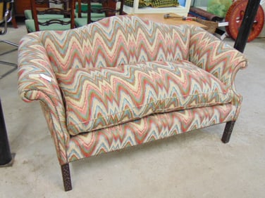 Chippendale loveseat, contemporary upholstery, carved legs, loveseat is 65" wide, 32" deep, height