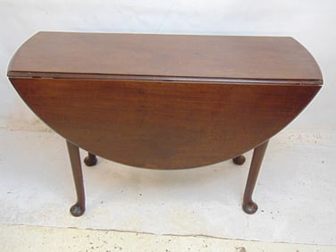 Antique Queen Anne drop leaf table, 45.5" wide, 45.5" round with leaves up, top is loose.