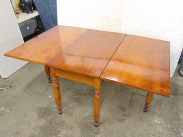 Cherry drop leaf table, 19th Century, table is 64.25" by 42" (opened), height is 28.75"