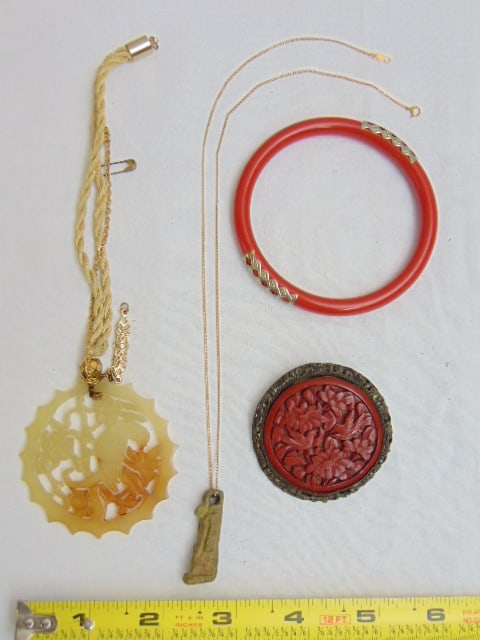 Jewelry. Asian lot: 14kt chain with stone figure, Egyptian? ; carved bird pendant russet jade; (1 of 5)