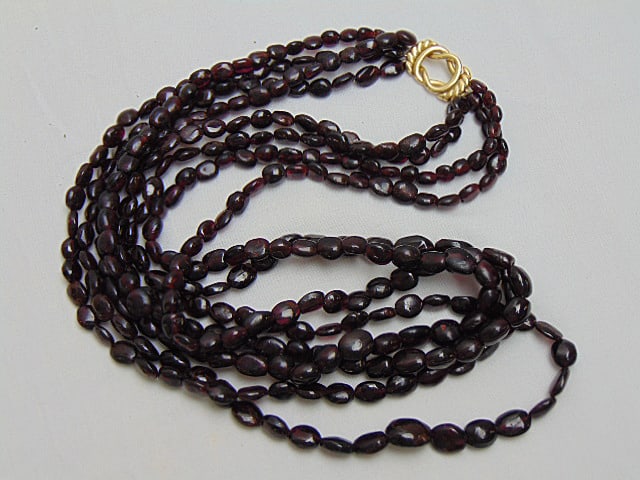 Jewelry. 18kt yellow gold triple strand amethyst beaded necklace, hallmark on clasp 750, length 12" (1 of 5)