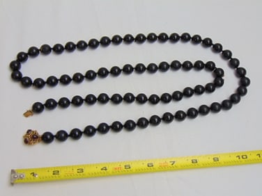 Jewelry. Vintage 14kt yellow gold clasp with cabochon stones, beaded cherry amber necklace, 7mm each