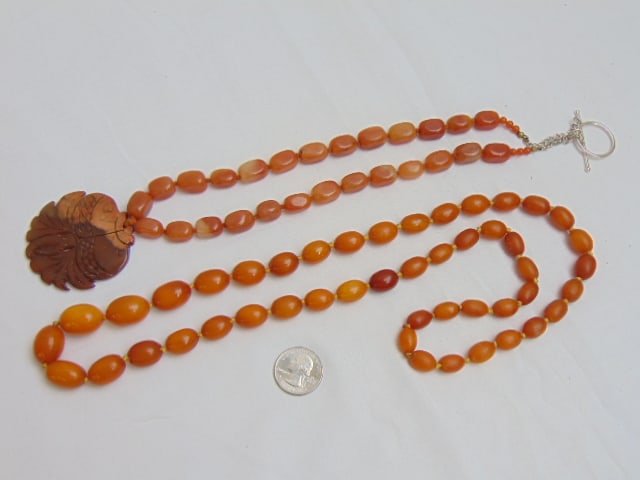 Jewelry. (2) Necklaces Butterscotch beaded necklace & stone necklace with carved pendant (1 of 4)