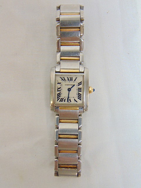 Jewelry. Cartier Tank Francaise steel yellow gold watch, water resistant Swiss made, 2300, CC476088,: Jewelry. Cartier Tank Francaise steel yellow gold watch, water resistant Swiss made, 2300, CC476088, 15mm face, roman numerals, estate found, no statements given to the working condition of this wrist