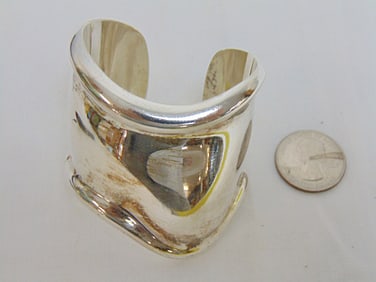 Jewelry. Tiffany & Co. Elsa Peretti bone cuff sterling silver, 2.49 troy oz, just over 2" widest