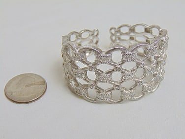 Jewelry. Judith Ripka sterling silver bracelet/cuff w/ CZ Thailand, hinge opening, 1 3/8" opening,