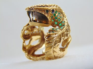 Jewelry. Torrini 18kt gold diamond & emerald snake ring, 20.80 grams, size 5 1/2, sapphire eyes,