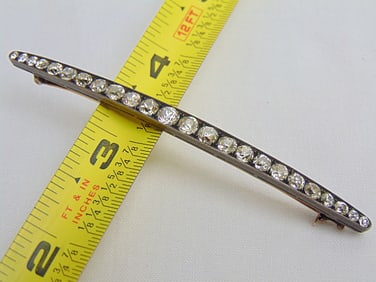 Jewelry. Antique silver top gold Diamond brooch/pin, 8.30 grams, 3 3/8" length, 24 individual round
