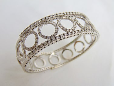 Jewelry. Diamond & White Gold bangle/bracelet, 36.65 grams ,circle design, no hallmarks, tested for